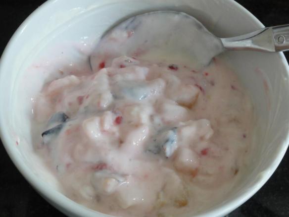 Yogurt with pear walnut prunes and raspberries